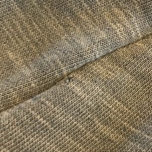 Photos of hole in cat and jack sweatshirt